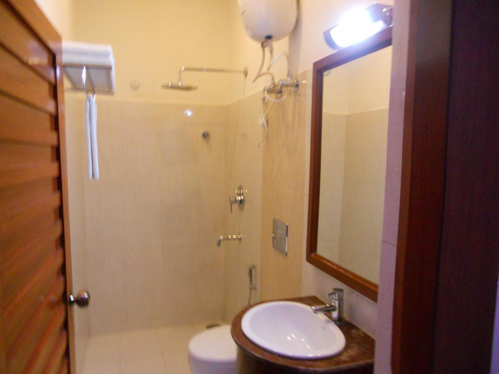 Hotel Prayag Aristro Club Kalkutta Zimmer foto