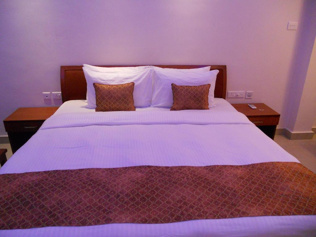 Hotel Prayag Aristro Club Kalkutta Zimmer foto