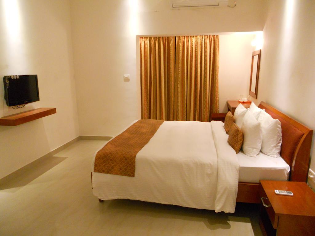 Hotel Prayag Aristro Club Kalkutta Zimmer foto